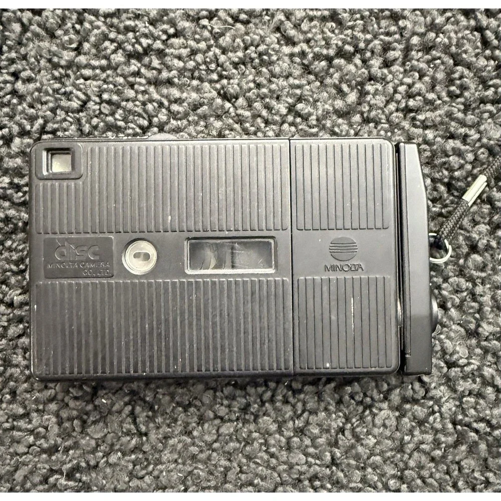 1983 Minolta Disc-7 Selfie Mirror Compact Disc Film Camera